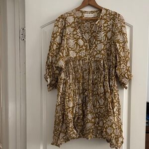 Daughters of India dress in olive